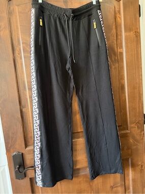 Versace Black Joggers with pink Greek Key Side Trim. Size 46. Like new Very soft